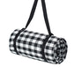 Rolled outdoor camping mat with black and white buffalo plaid pattern, with hanging straps