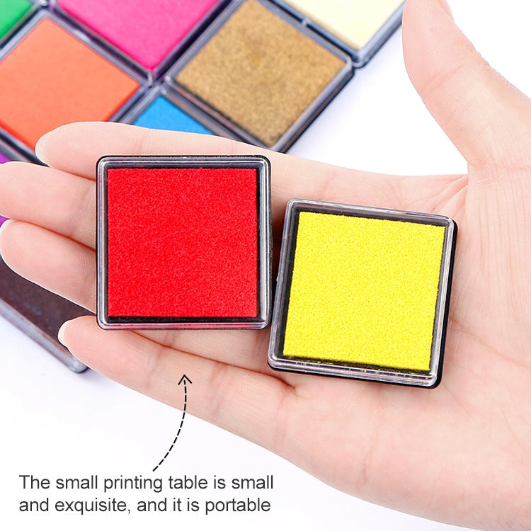Small ink pad set in hand: red ink pad and yellow ink pad, square sponges