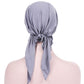 Light gray curved wrap cap turban hat with gathered back knot and hanging tail