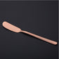 Rose gold butter knife with a smooth rounded spreader blade and long handle.