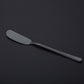 Stainless steel butter knife with smooth rounded blade and tapered handle