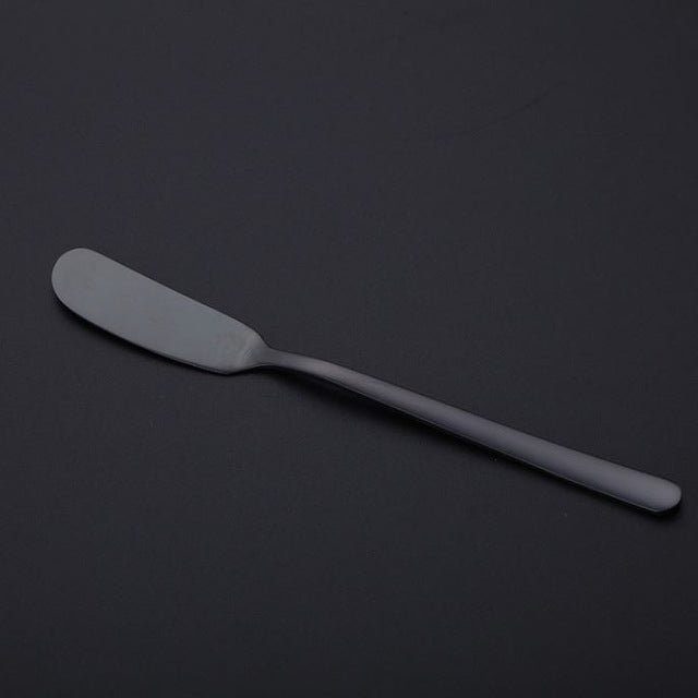 Stainless steel butter knife with smooth rounded blade and tapered handle