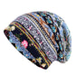Rolled cotton hat wrap with multicolor floral-and-stripe print on blue fabric