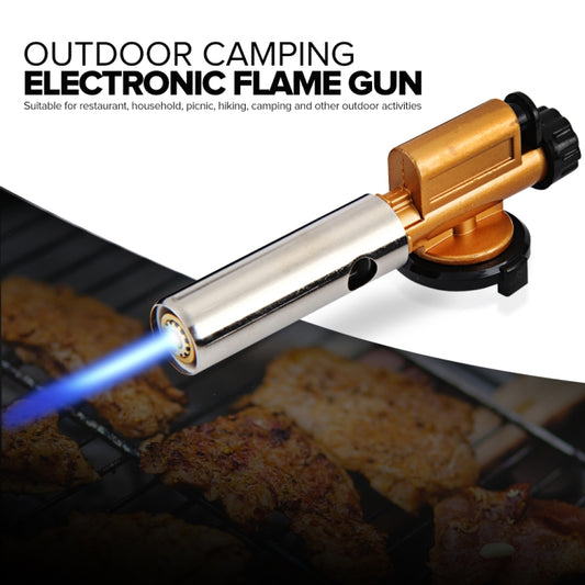 Butane electronic ignition flame gun emitting blue flame from nozzle on grill.