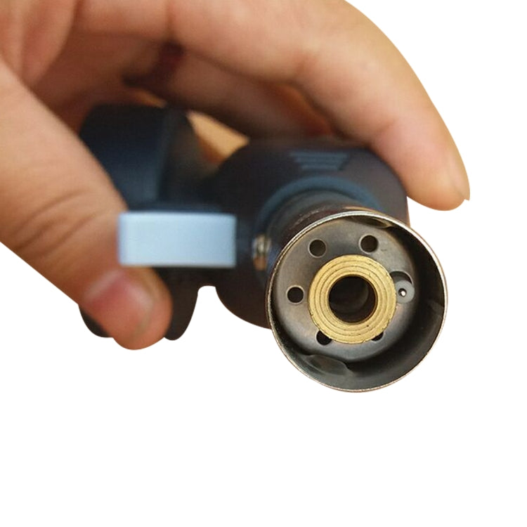 Hand holding butane flame gun torch head with circular burner ignition port