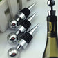 Two chrome wine bottle stoppers with black ribbed rubber and pointed tapered ends
