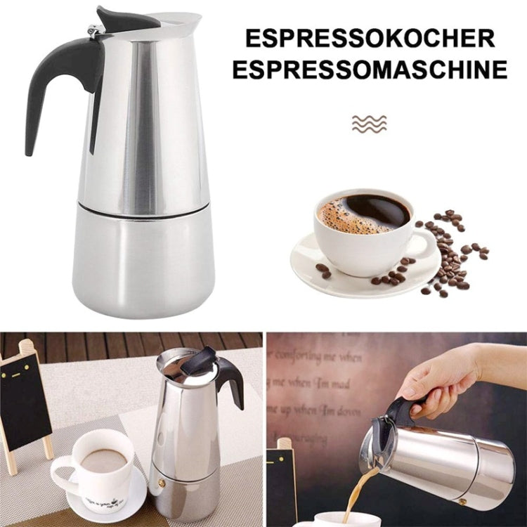 Stainless steel moka coffee maker pot with black handle and spout knob