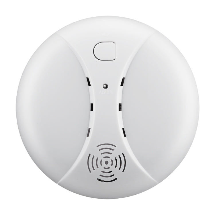 White wireless smoke detector top view with central vents and one reset button