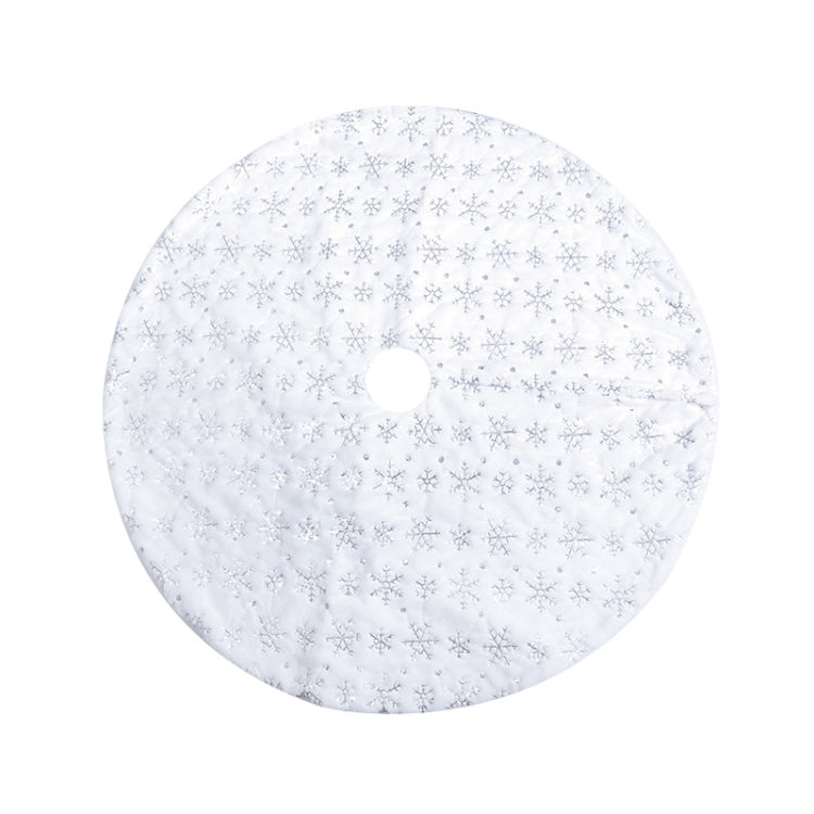 Plush decorative tree skirt with silver-toned snowflake sequin embroidery and center hole
