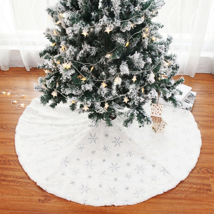 Plush tree skirt with silver-toned snowflake sequin embroidery for tree base