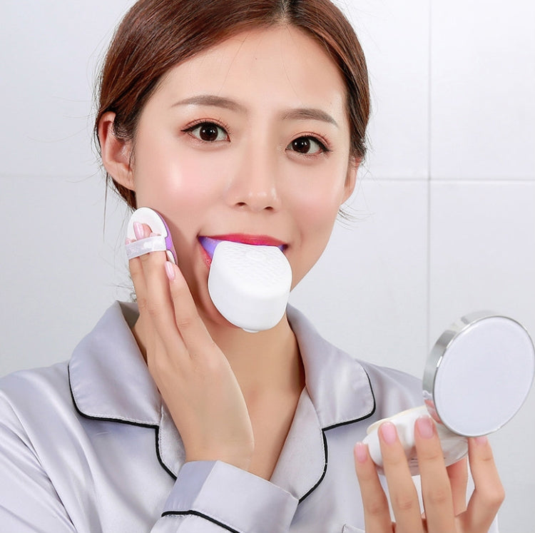 U-shaped electric toothbrush in white; person holds device near mouth