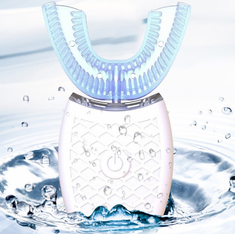 White U-shaped electric toothbrush with blue bristle tray and textured base