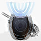 Black-and-white U-shaped electric toothbrush with blue bristle tray and vents