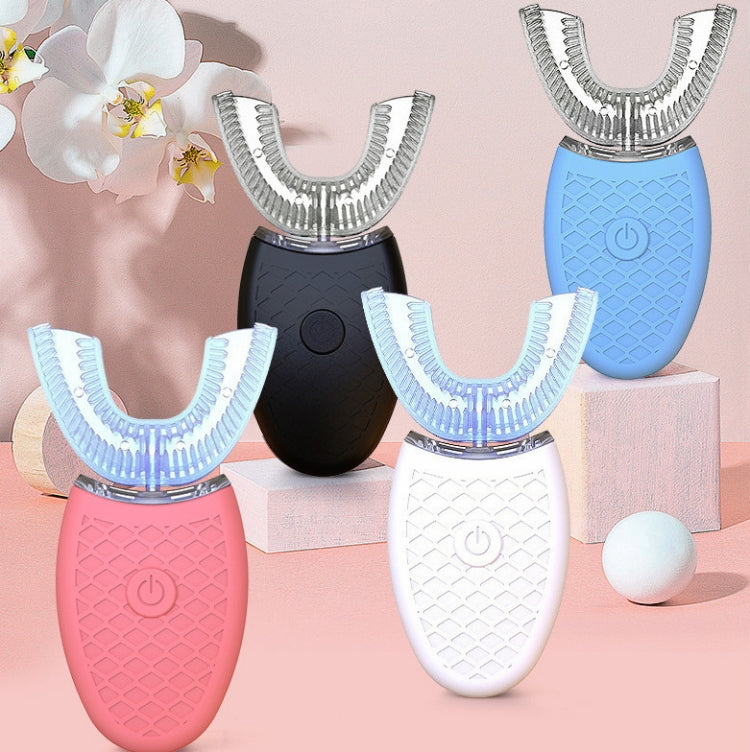 Set of U-shaped electric toothbrushes in pink, blue, black, and white