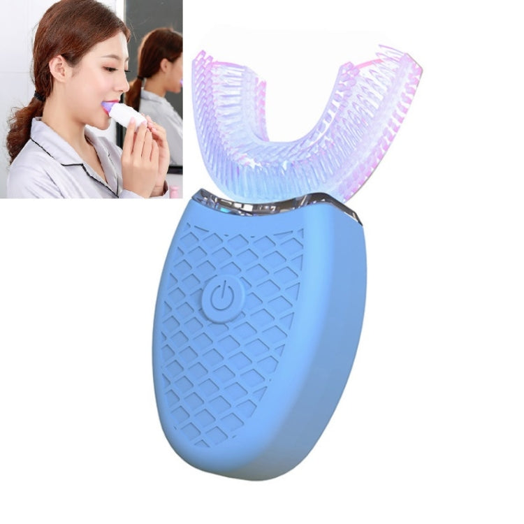 U-shaped electric toothbrush with light blue handle and purple-blue bristle tray