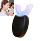 U-shaped electric toothbrush with black handle and purple-blue bristle tray