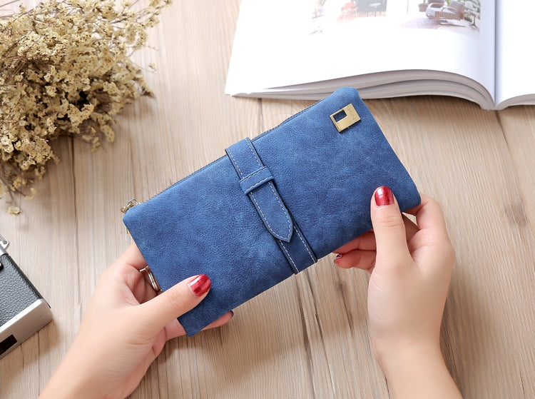 Blue suede-style clutch wallet phone bag with flap strap and gold-tone clasp; held up.