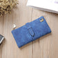 Blue suede-style long wallet phone bag with zip, wrap flap strap, and gold-tone clasp.