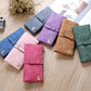 Set of solid suede-style long wallet phone bags in blue, pink, purple, and green.