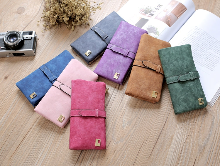 Set of solid suede-style long wallet phone bags in blue, pink, purple, and green.