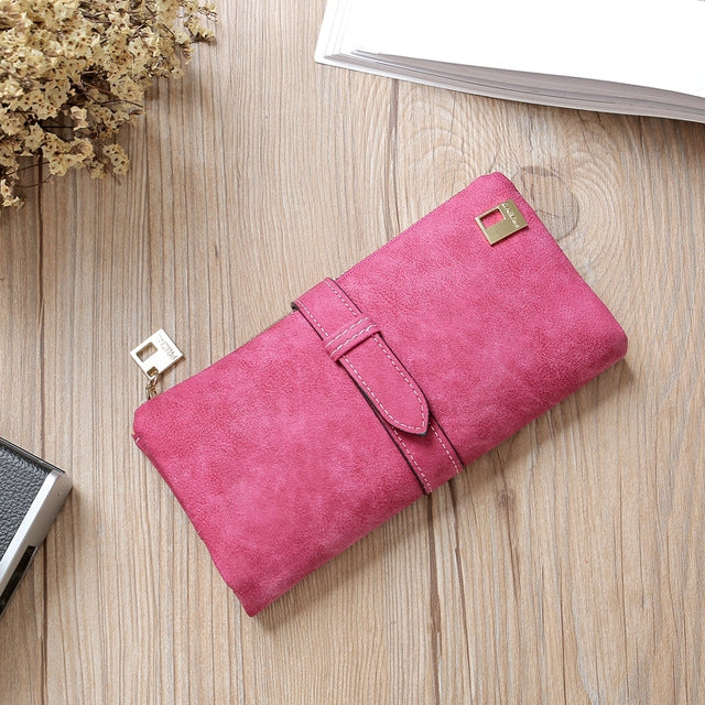 Rose red suede-style long wallet phone bag with zip, wrap flap strap, and gold-tone clasp.