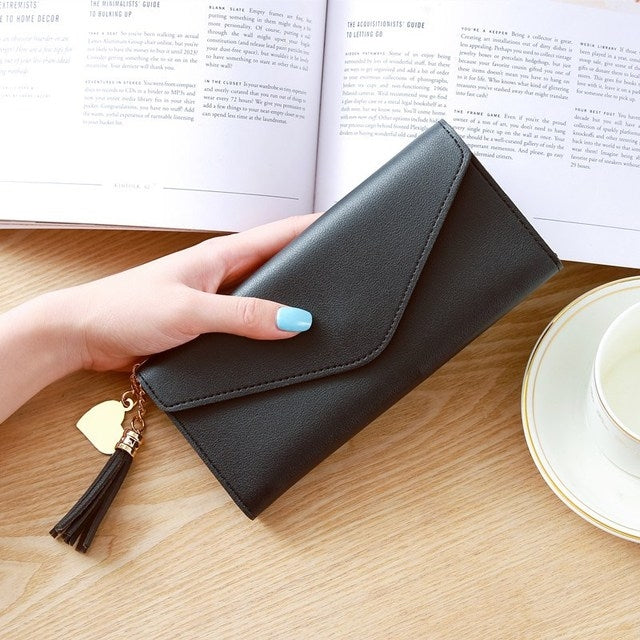 Dark gray long zipper clutch wallet with tassel charm and gold-tone chain