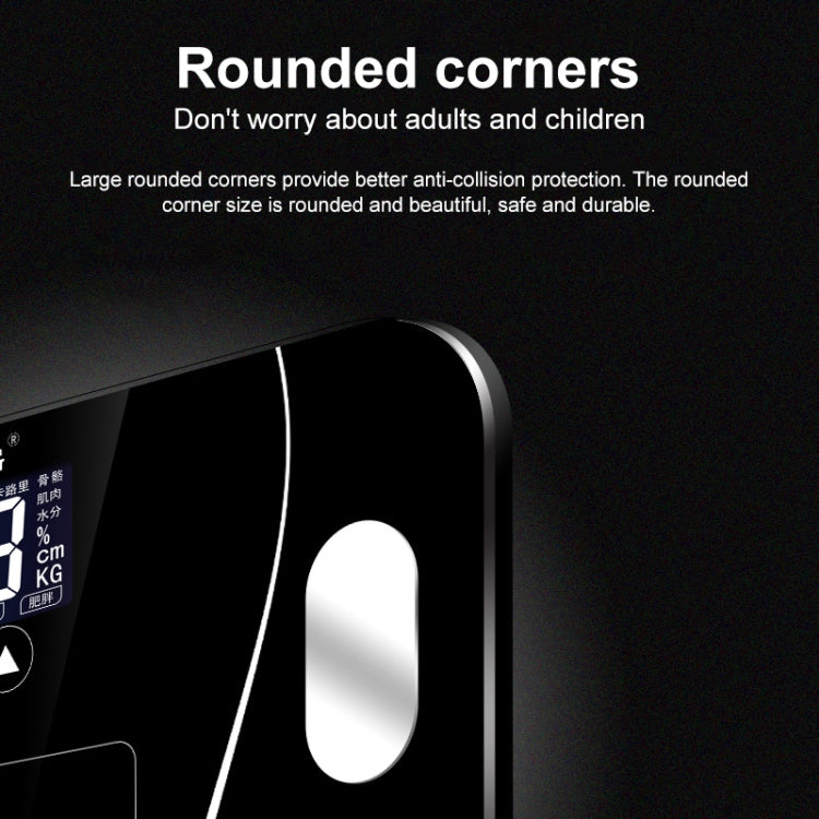 Black digital bathroom scale corner with silver trim and oval electrode sensor
