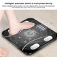 Black digital bathroom weighing scale with LCD screen and foot on sensor platform