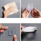 Wall-mounted split ashtray, white with open lid and hands cleaning and removing cover