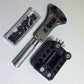 14-in-1 watch repair tool with black base plate, screw holes, silver handle, and small parts