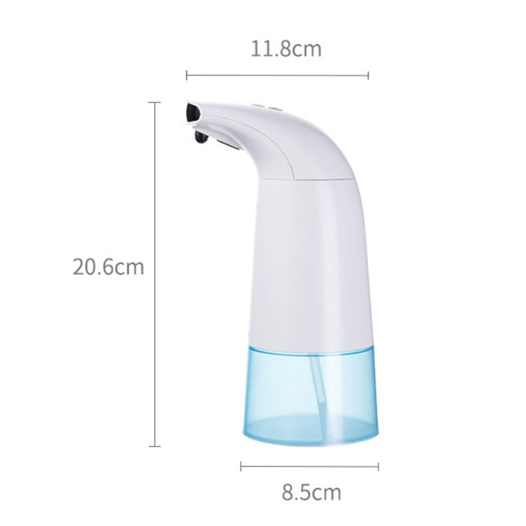 Compact automatic foam soap dispenser in side view, white body with blue base