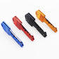 Mini folding knives in blue, red, black, and orange key-shaped handles with blades