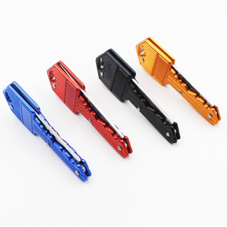 Mini folding knives in blue, red, black, and orange key-shaped handles with blades