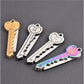 Mini key knife keychain with gold, silver, and rainbow finishes and open blades