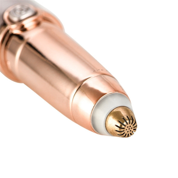 Rose gold electric trimmer with circular grooming head, close-up
