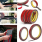 Red double-sided acrylic foam tape rolls with release liner strips