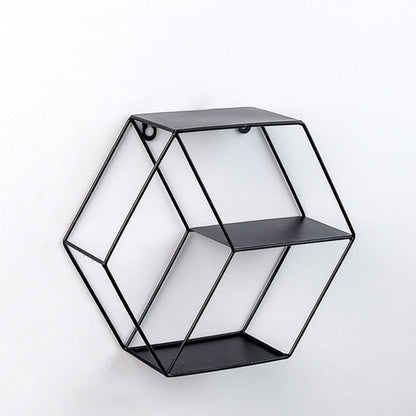 Black hexagonal wrought-iron hanging wall shelf with open grid tiers