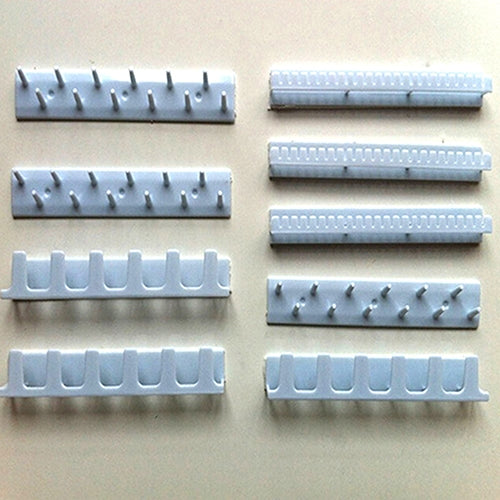 Light blue adhesive jewelry hook strips with metal pegs for earrings and necklaces