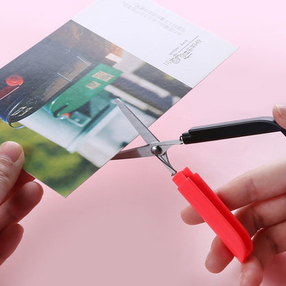 Red folding safety mini scissors with black blade and protective cover