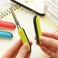 Lime green folding mini scissors with black blade cover and small finger guard