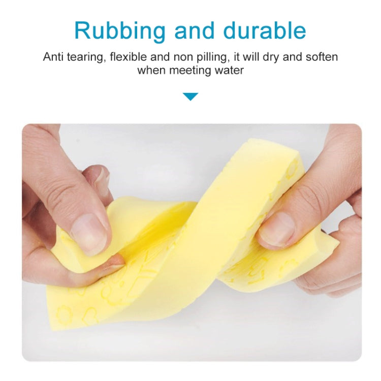 Yellow square bath sponge held by hands, embossed animal and love pattern