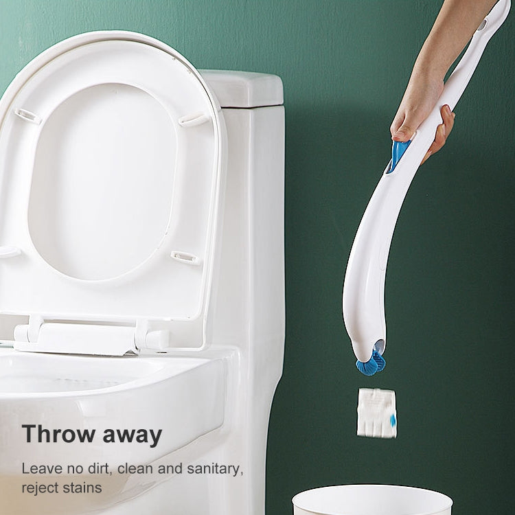 Disposable toilet brush with blue scrubbing head and white handle held for use