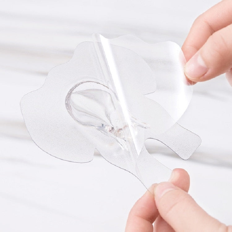 Clear elephant wall hook being applied with adhesive sheet, waterproof style