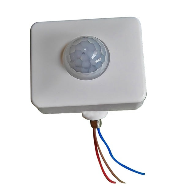White PIR motion sensor wall spotlight switch with rounded detector lens and wire leads