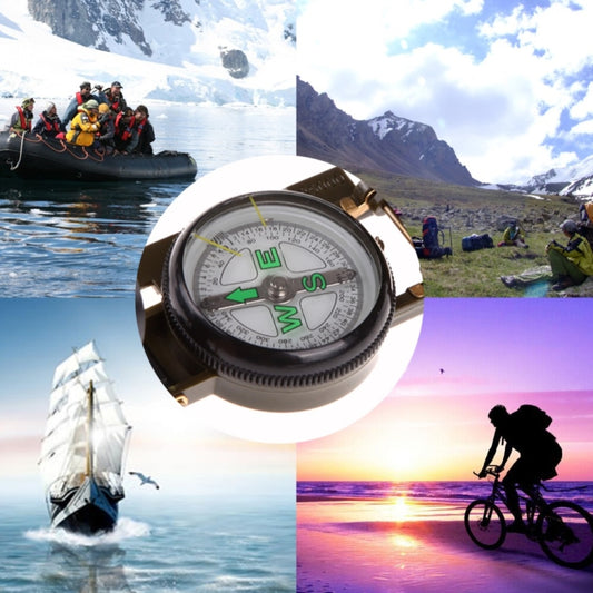 Army green compass with round dial and green wind-rose markings in tool housing