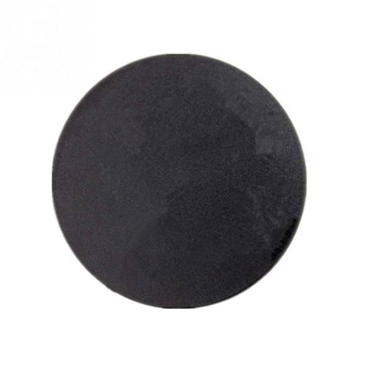 Black round compass back cover, smooth plastic disc without visible markings