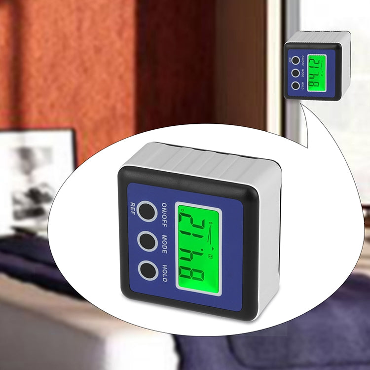 Blue digital tilt meter with green LCD and magnetic base attached to a door frame.