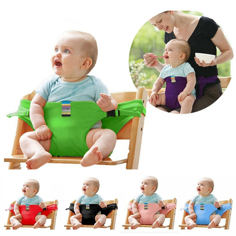 Green baby chair seat safety harness on a dining booster with straps and buckle