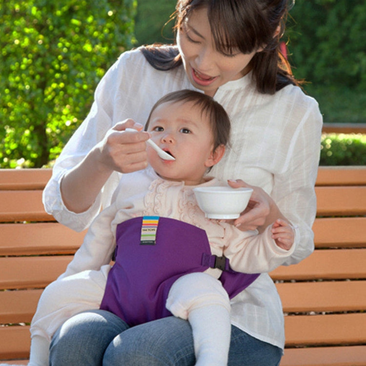 Purple baby chair seat safety harness booster on an infant seated