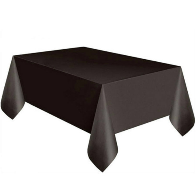 Disposable plastic tablecloth in solid black, rectangular with draped corner drops.